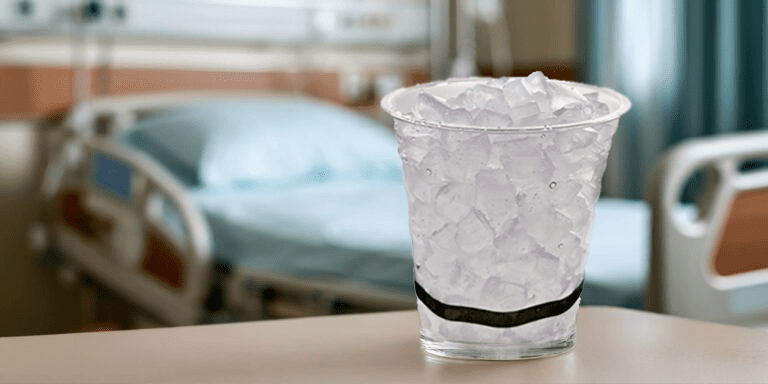 Hoshizaki cup of ice on a table in a hospital room
